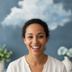 Close-up portrait of a happy woman in her late 20s, smiling genuinely, conveying satisfaction and trust.